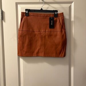 NWT- Cognac Vegan Leather Mini Skirt